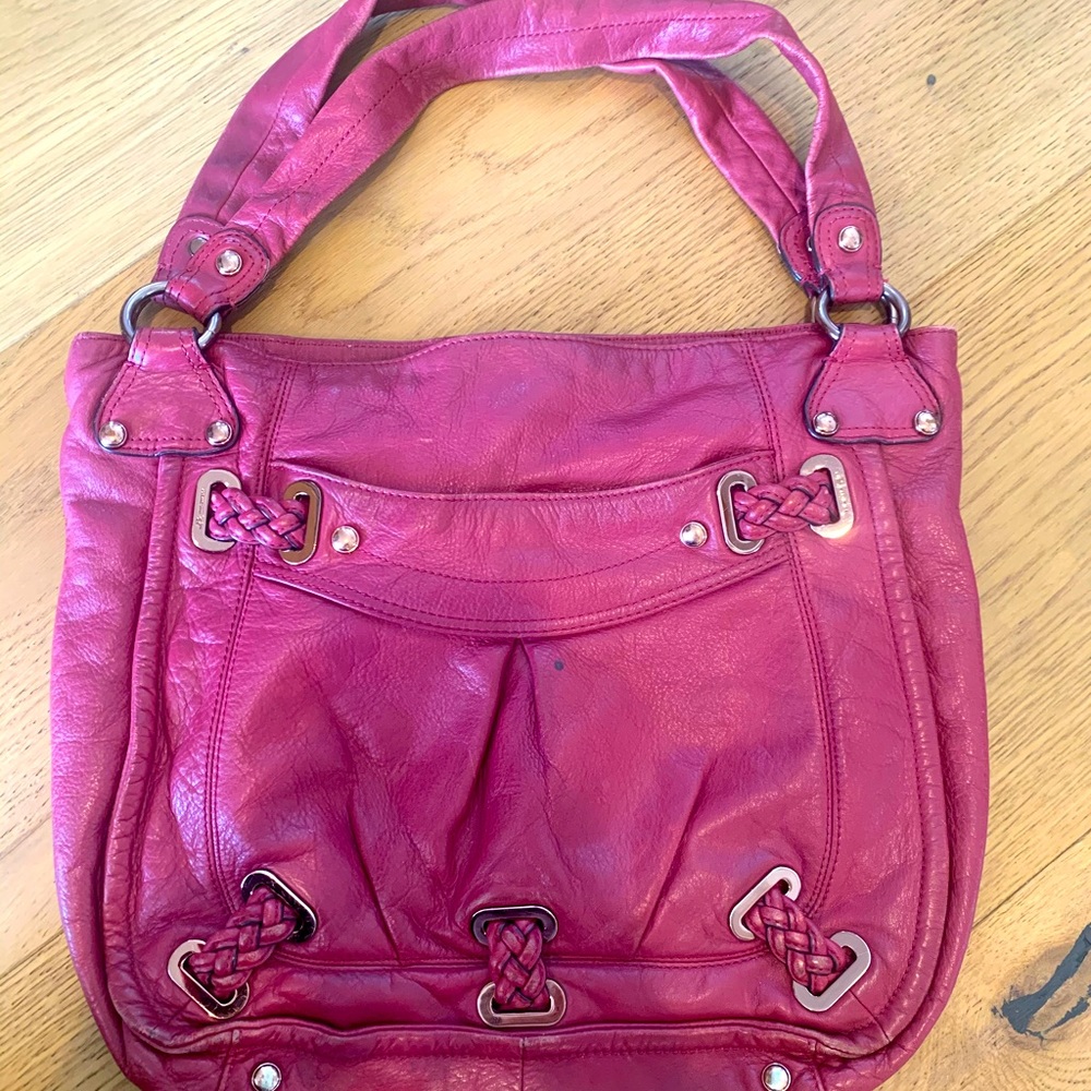 Beautiful leather purse in bright raspberry pink.